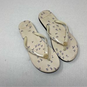 Tory Burch Ivory and Gold Flip Flops